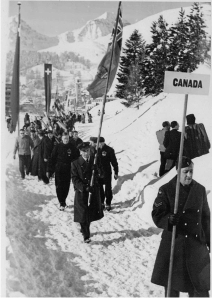 Photo: Hubert Brooks Carrying Canadian Flag at Opening Ceremonies 1948 Winter Olympics
